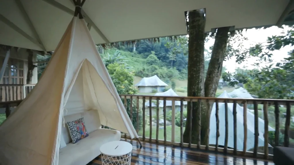 Canopy daybed on the Ficus Treehouse deck with rainforest views